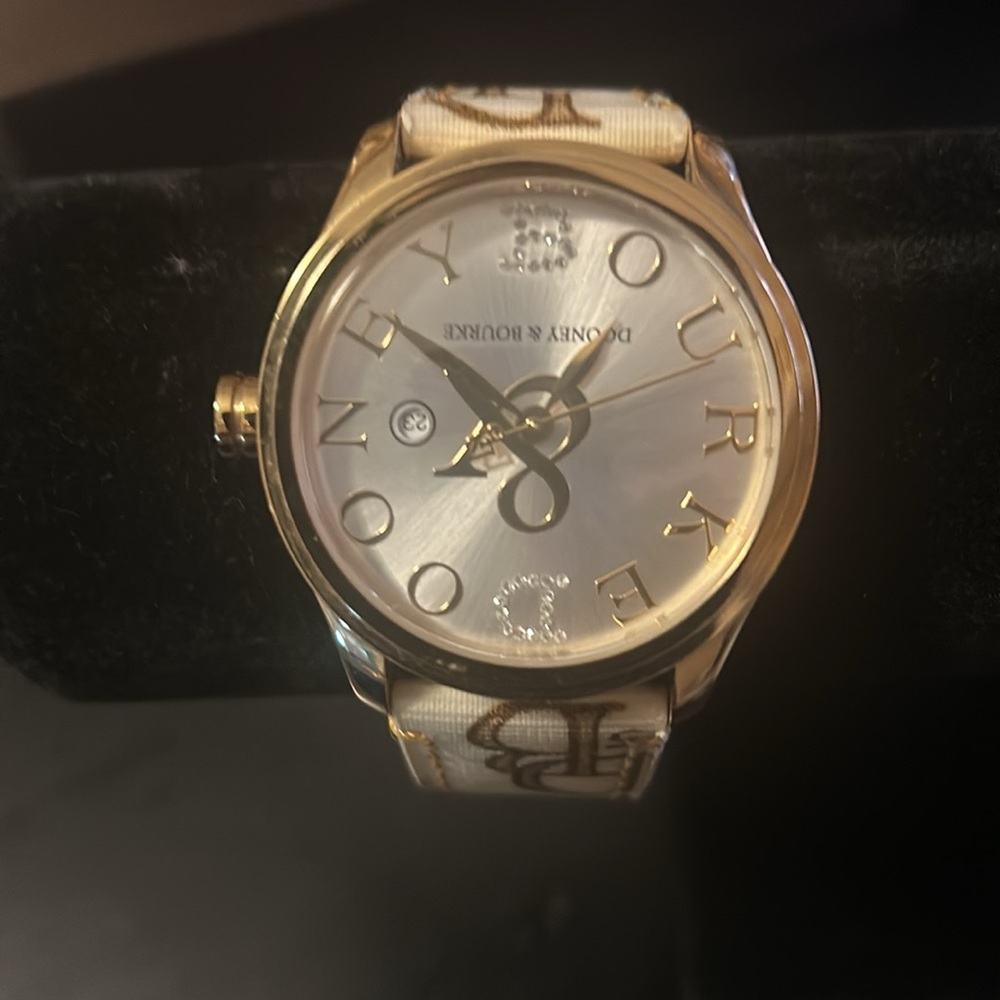 Dooney & Bourke tan and cream watch.  Canvas strap with DB initials. Beautiful - Picture 7 of 11